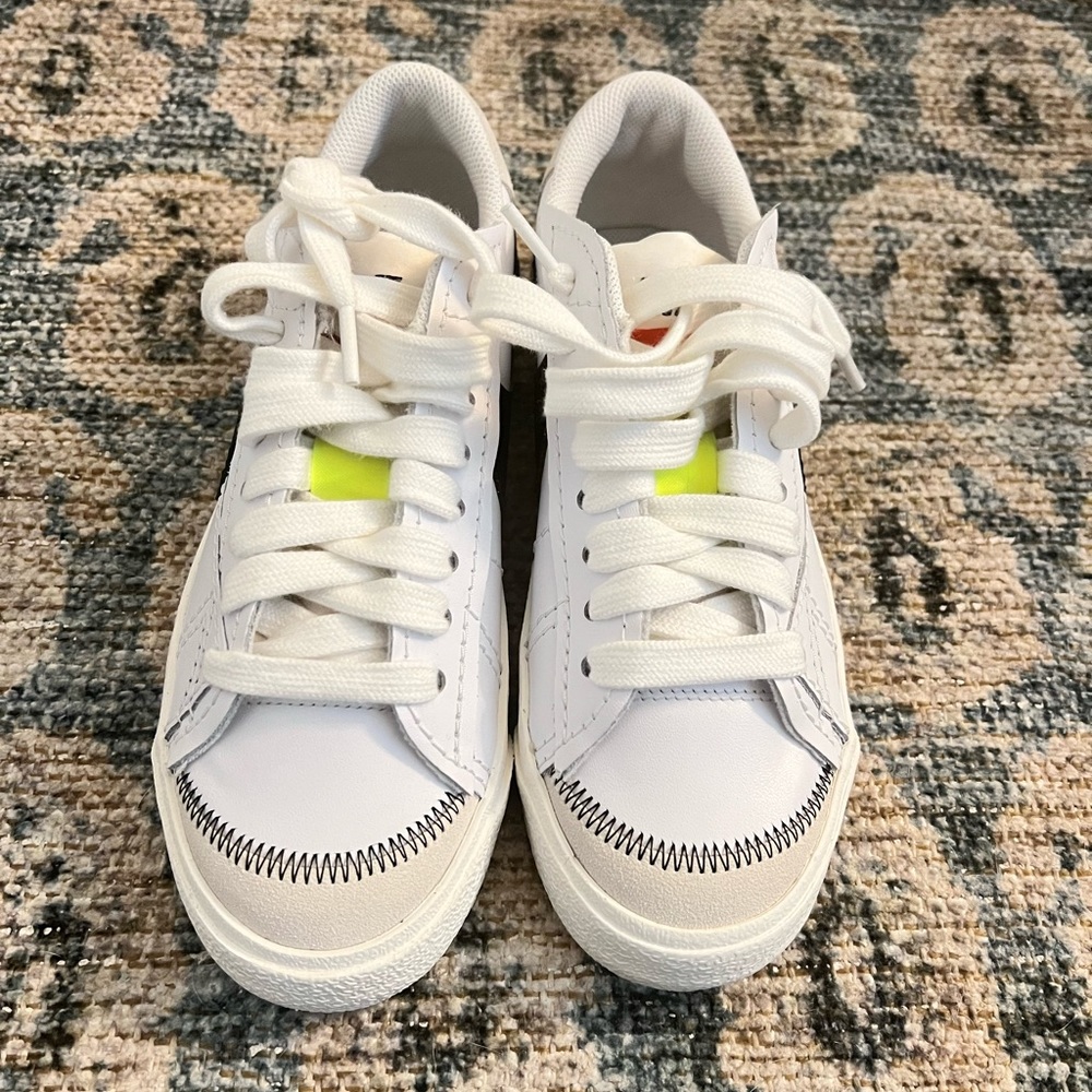 Nike street style sneakers. Never worn, size 7. White with black checks